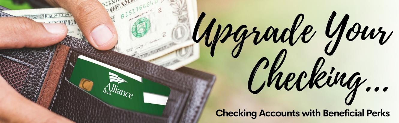 Wallet with cash being taken out and Alliance Bank debit card with Upgrade your checking text