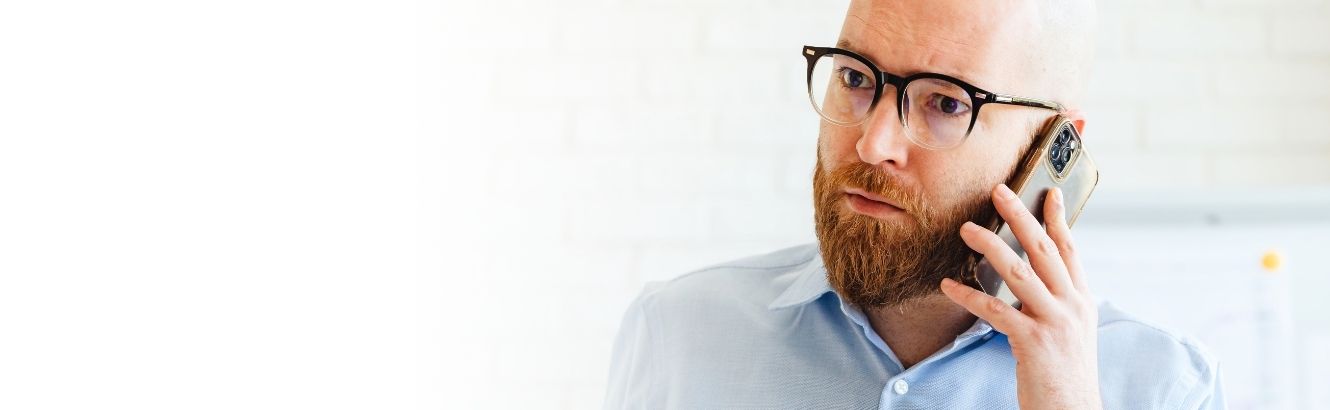 Image of gentleman on a phone.