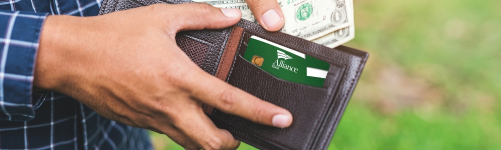 Image of an Alliance Bank Debit Card in a wallet.